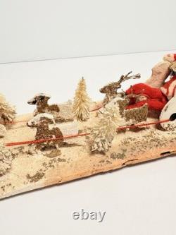 1940s Clay Face Santa with Putz Sleigh and Reindeer Paper Mache Champagne Bottle