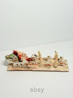 1940s Clay Face Santa with Putz Sleigh and Reindeer Paper Mache Champagne Bottle