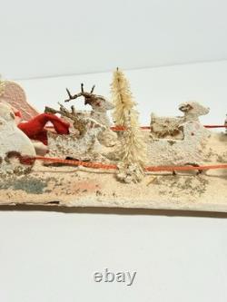 1940s Clay Face Santa with Putz Sleigh and Reindeer Paper Mache Champagne Bottle