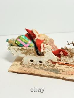 1940s Clay Face Santa with Putz Sleigh and Reindeer Paper Mache Champagne Bottle