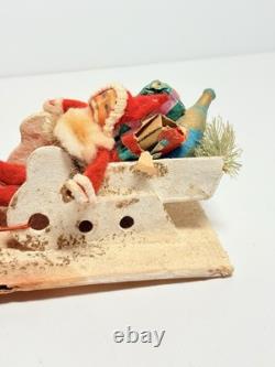 1940s Clay Face Santa with Putz Sleigh and Reindeer Paper Mache Champagne Bottle