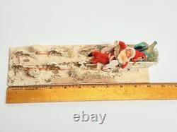 1940s Clay Face Santa with Putz Sleigh and Reindeer Paper Mache Champagne Bottle