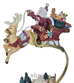 1995 Mercuries Large Bouncing Flying Santa with Reindeer Sleigh Village