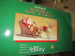 1998 Christmas Holiday Creations Animated Reindeer and Santa in Sleigh Musical