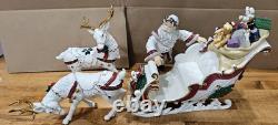 4 Pc Porcelain Christmas Ensemble Santa, Sleigh, Two Reindeers Read