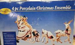 4 Pc Porcelain Christmas Ensemble Santa, Sleigh, Two Reindeers Read