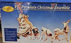 4 Pc Porcelain Christmas Ensemble Santa, Sleigh, Two Reindeers Read