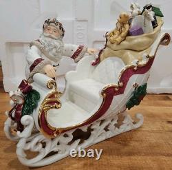 4 Pc Porcelain Christmas Ensemble Santa, Sleigh, Two Reindeers Read