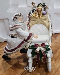 4 Pc Porcelain Christmas Ensemble Santa, Sleigh, Two Reindeers Read