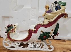 4 Pc Porcelain Christmas Ensemble Santa, Sleigh, Two Reindeers Read