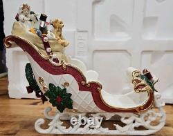 4 Pc Porcelain Christmas Ensemble Santa, Sleigh, Two Reindeers Read