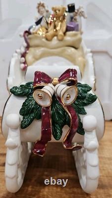 4 Pc Porcelain Christmas Ensemble Santa, Sleigh, Two Reindeers Read