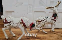 4 Pc Porcelain Christmas Ensemble Santa, Sleigh, Two Reindeers Read