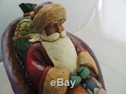 4 pc Jim Shore Delivering Joy Santa in Sleigh & 3 Dash Away Reindeer