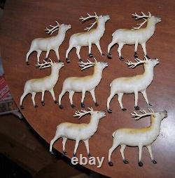8 celluloid reindeer made in Occupied Japan plus Santa and Sleigh
