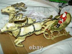 All ORIGINAL 1906 Hubley cast iron wheeled SANTA in Sleigh & 2 Reindeer complete