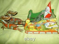 All ORIGINAL 1906 Hubley cast iron wheeled SANTA in Sleigh & 2 Reindeer complete