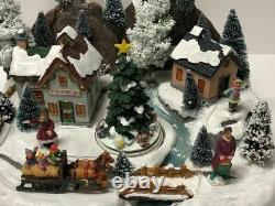 Animated Musical Christmas Rotating Santa's Sleigh and Reindeer Village