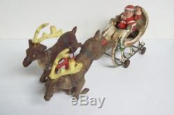 Antique Cast Iron Christmas SANTA CLAUS on Painted SLEIGH & REINDEER on Wheels
