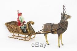 Antique German Reindeer Candy Container Pulling Santa in Loofah Sleigh ca1905