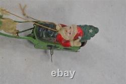 Antique santa/sleigh/reindeer toy wind-up red green tin celluloid Japan works