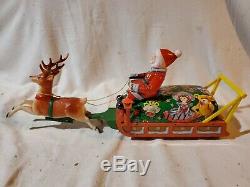 Battery Operated Santa Claus On Reindeer Sleigh Tin Toy tested original box