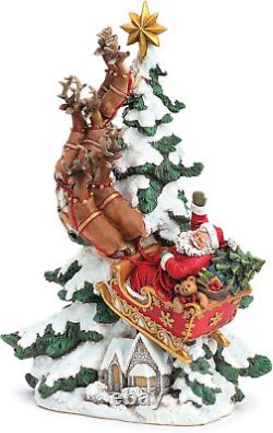 By Roman Santa in Sleigh with Reindeer over Village Figure, 15.25 H, Resin an