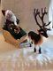 Byers Choice Santa Claus Holding Wreath & Whip In Ceramic Sleigh With Reindeer