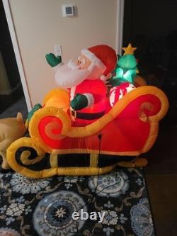 Gemmy 2010 7 foot inflatable animated Santos sleigh with reindeer