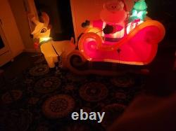 Gemmy 2010 7 foot inflatable animated Santos sleigh with reindeer