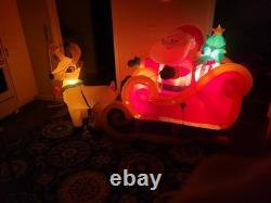 Gemmy 2010 7 foot inflatable animated Santos sleigh with reindeer