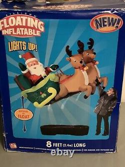 Gemmy Airblown Floating Inflatable Santa Sleigh Reindeers 8 Ft Tall