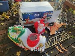 General Foam Lighted Santa Claus Sleigh & Reindeer Lighted Christmas Blow Mold