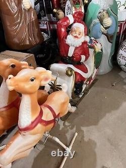 Giant santa in sleigh with 7 reindeer's blowmold