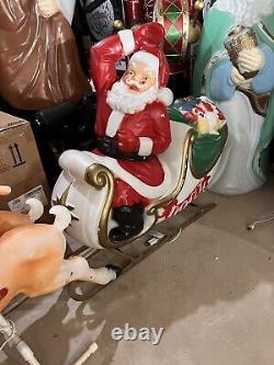 Giant santa in sleigh with 7 reindeer's blowmold