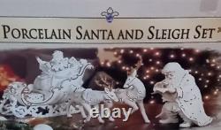 Grandeur Noel 2001 Collectors Edition Porcelain Santa and Sleigh withReindeer Set