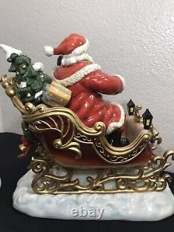 Grandeur Noel 2003 Porcelain santa in sleigh and reindeer set