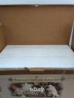 Grandeur Noel Porcelain Santa, Sleigh Set & ONE Reindeer 2001 Collectors Edition