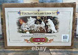 Grandeur Noel Porcelain Santa and Sleigh Set withReindeer 2001 Collector's Edition