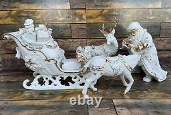 Grandeur Noel Porcelain Santa and Sleigh Set withReindeer 2001 Collector's Edition