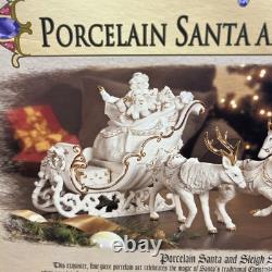 Grandeur Noel Porcelain Santa and Sleigh Set with Reindeer 2001 Collectors Edition