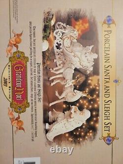 Grandeur Noel Porcelain Santa and Sleigh Set with Reindeer 2001 Collectors Edition