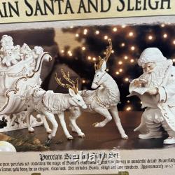 Grandeur Noel Porcelain Santa and Sleigh Set with Reindeer 2001 Collectors Edition