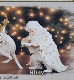 Grandeur Noel Porcelain Santa and Sleigh Set with Reindeer 2001 Collectors Edition
