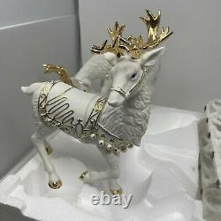 Grandeur Noel Santa Sleigh Reindeer White Porcelain Christmas Ensemble 2000