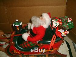 Holiday Creations Animated Musical Santa with Reindeer and Sleigh in Box