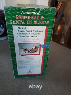 Holiday Creations Animated Reindeer & Santa in Sleigh in Box Musical Works Great