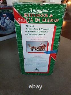 Holiday Creations Animated Reindeer & Santa in Sleigh in Box Musical Works Great