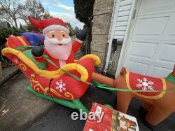 Home Accents Airblown Inflatable 16 ft Santa and Sleigh With Reindeer Gemmy
