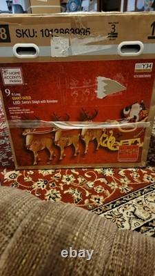 Home Accents Holiday 9 ft LED Santa Sleigh with Reindeer Freestanding Decor